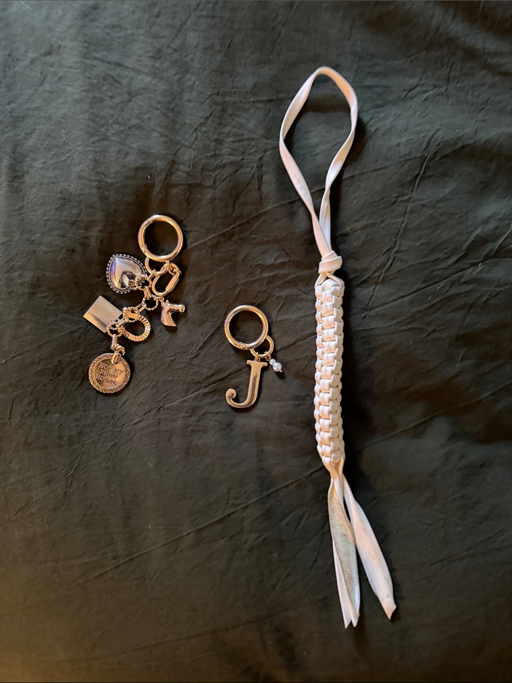 A New Day bag charms in GUC (the charms are almost brand new!)